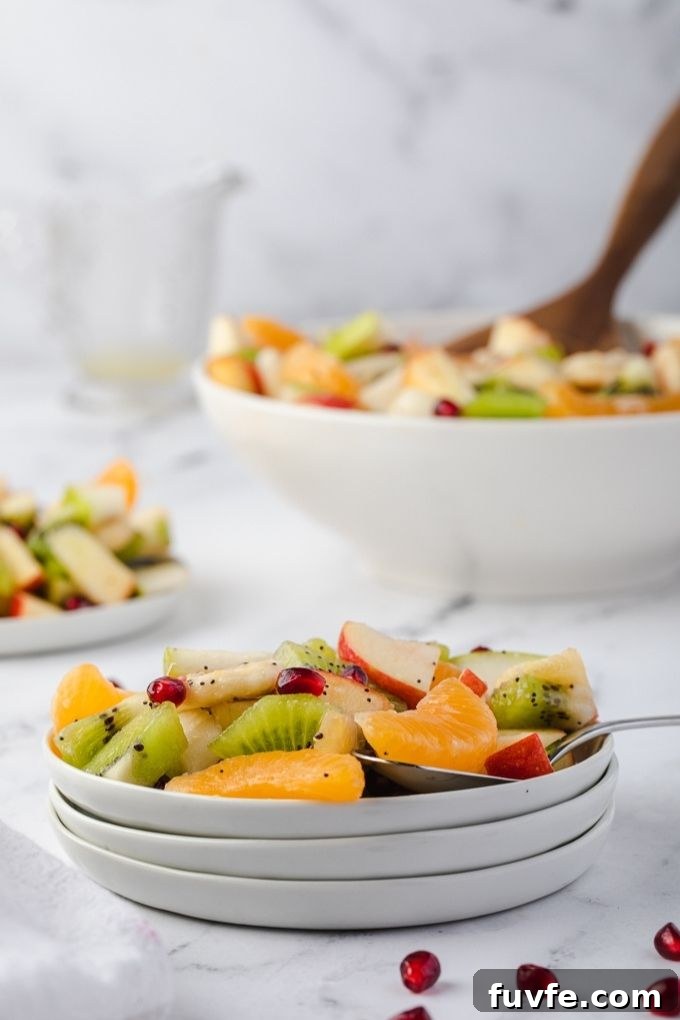 Small plates filled with winter fruit salad