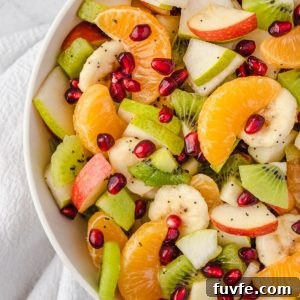 Winter fruit salad in a white bowl
