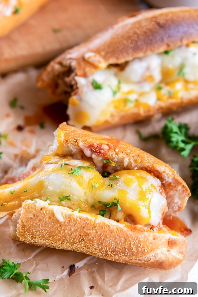 Slow Cooker BBQ Meatball Subs Recipe 9 Meatball sub with cheese pulling
