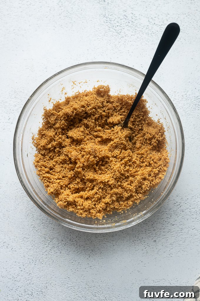 Prepare the graham cracker crust.