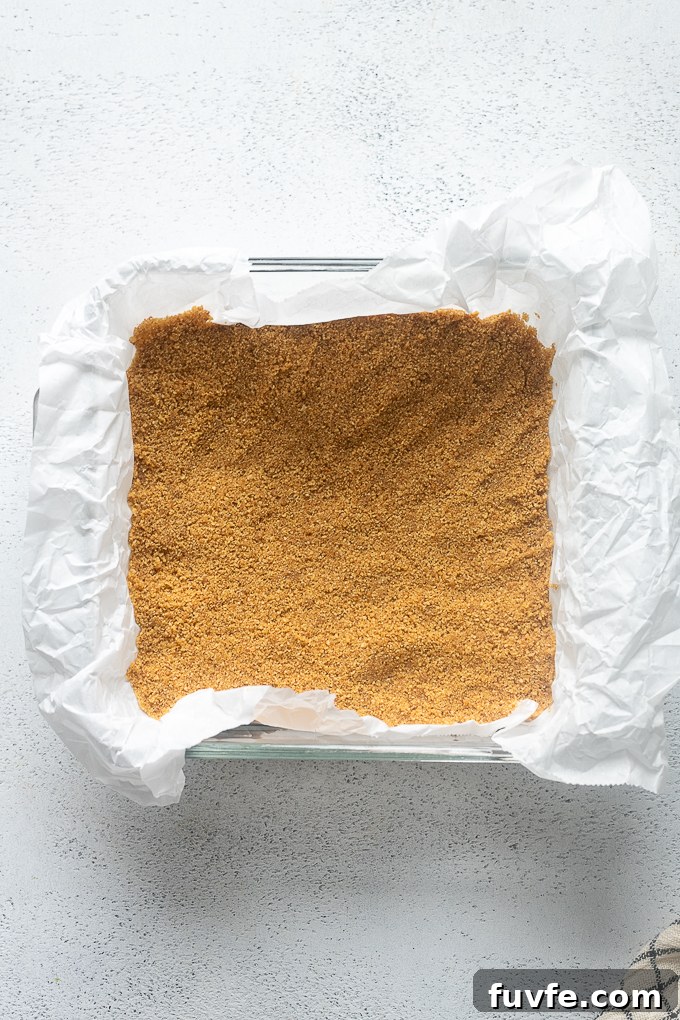 Graham cracker crust before baking.
