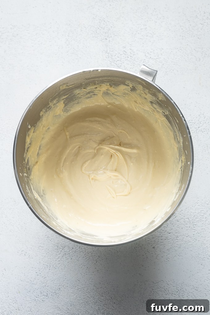 Beaten cheesecake filling for key lime cheesecake bars.