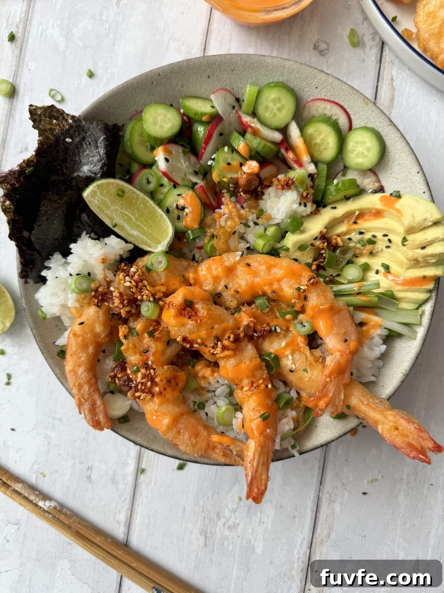 ebi tempura rice bowl with avocado and cucumber