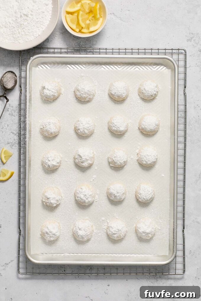 Meyer Lemon Kourabiedes Recipe: Greek Butter Cookies 6 Greek butter cookies on a baking sheet.